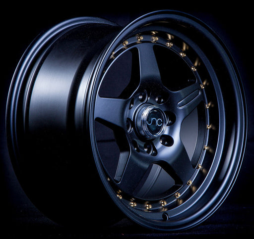 JNC-JNC009-Matte-Black-Gold-Rivets-Black-15x8-73.1-wheels-rims-felger-FelgGiganten
